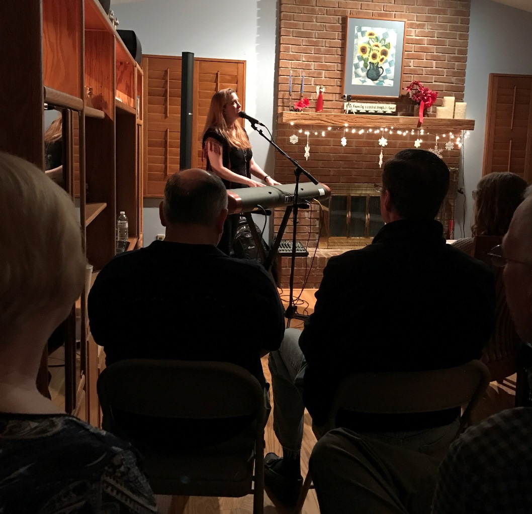 Kira Small performs at a house concert hosted by Barbara and Mark Routen