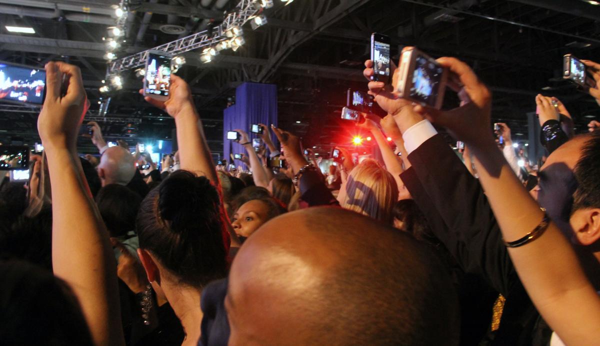 Crowd holding smartphones
