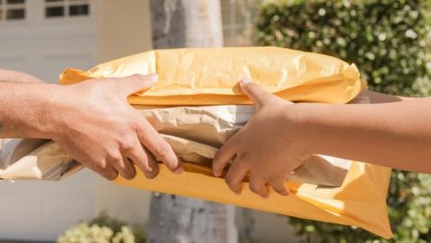 Padded envelope packages changing hands