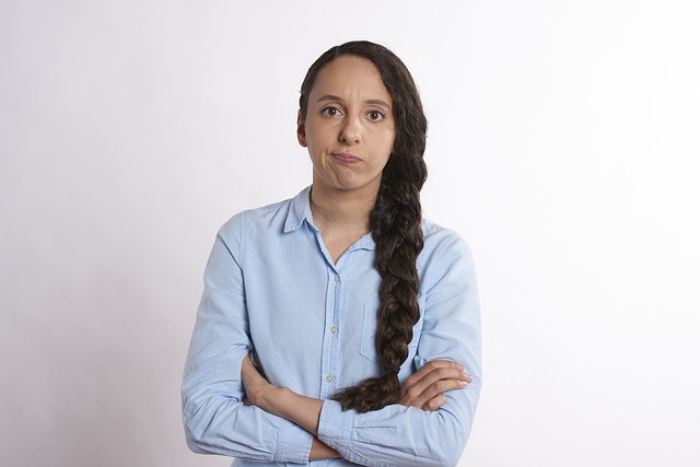 Girl with arms crossed giving attitude