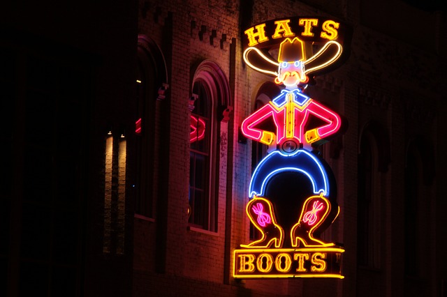 Hats boots neon sign in Nashville