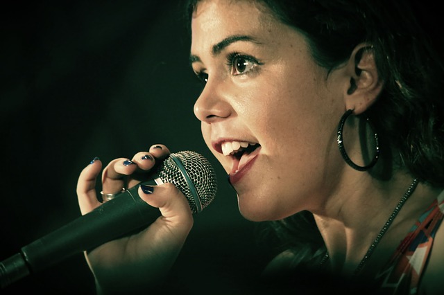 Girl singing into microphone