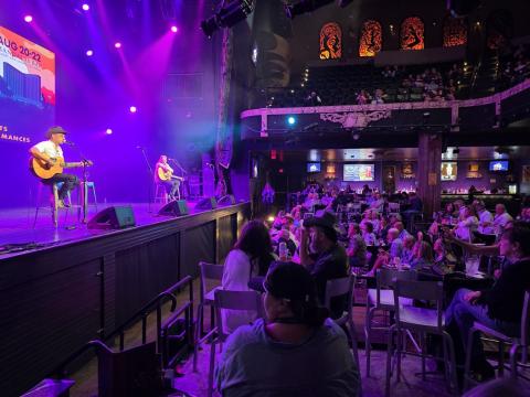 Two songwriters on stage at the kickoff of the event in Las Vegas last week